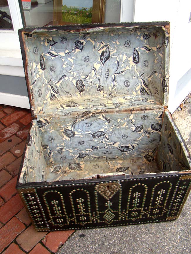 A late 18th or early 19th century brass decorated leather trunk with canted top — image 3